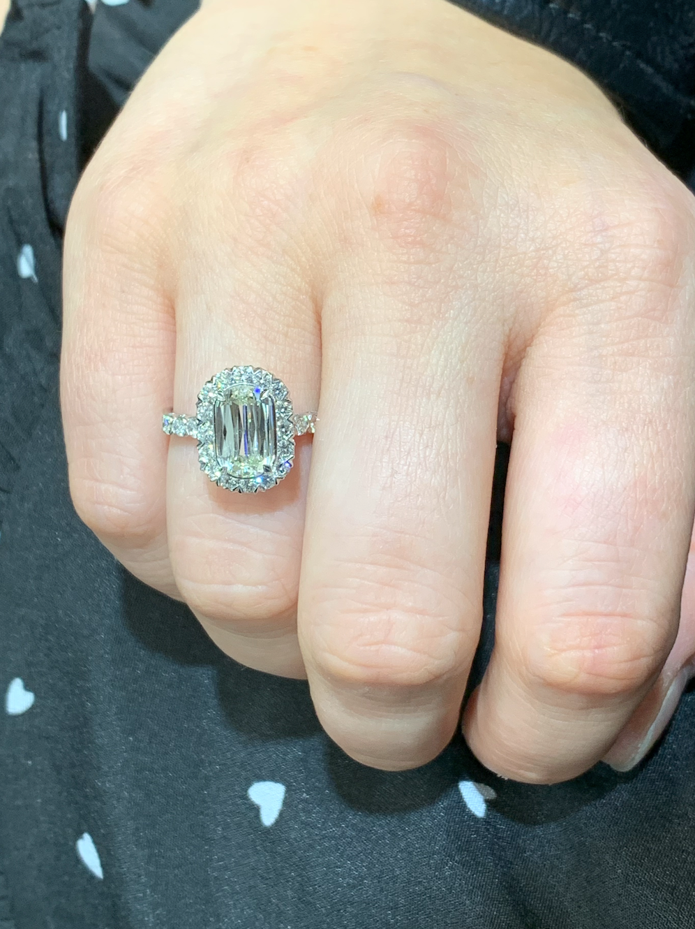 Criss cut store diamond engagement ring